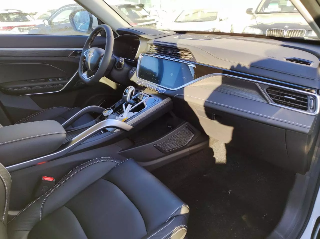 Автосалон: Geely Atlas Pro